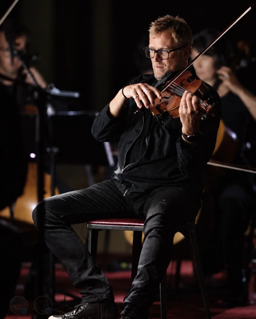 Bruce White performing on viola